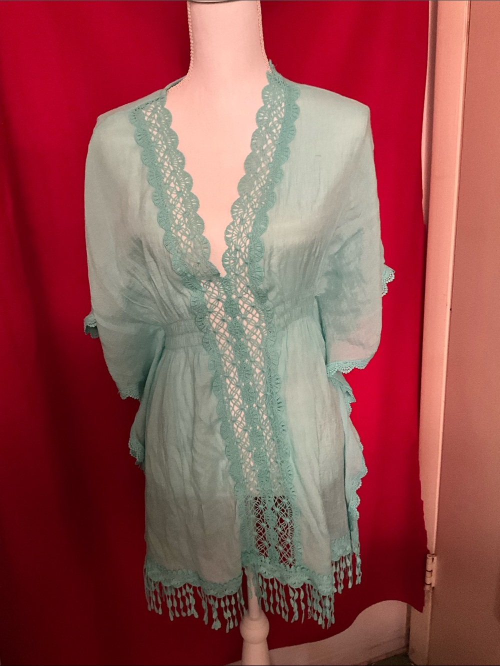 Light weight beach coverup with embroidered trip